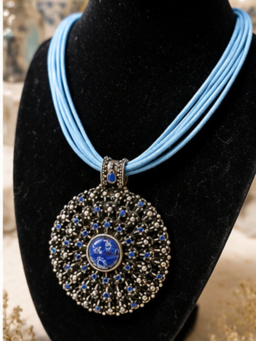 Multi-Strand Blue Statement Necklace with Ornate Filigree Pendant